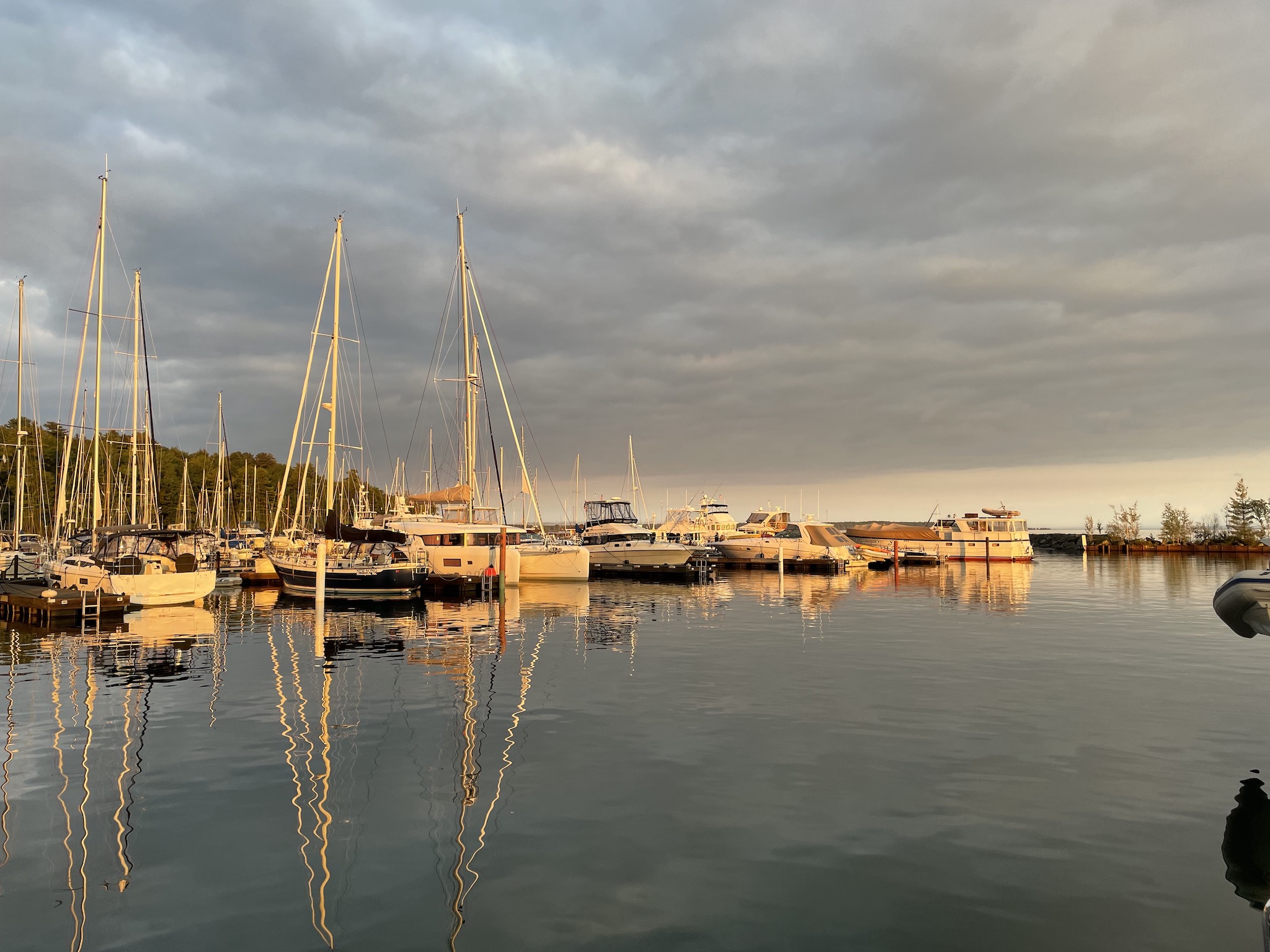Sunrise over boats at Pikes Bay Marina